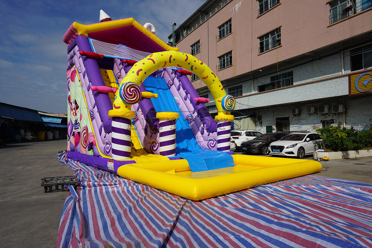 Inflatable water slide with pool